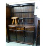 A stained pine reproduction dresser havi