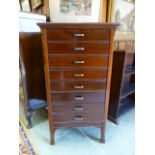 A mid-20th century mahogany eight drawer