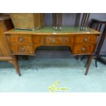 A reproduction serpentine fronted desk h