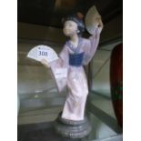 A Lladro figure of a lady with fans