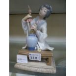 A Lladro figure of a Japanese lady with