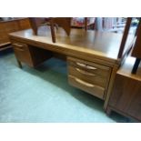 A mid-20th century design teak desk by J