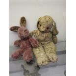 A mid-20th century soft rabbit toy toget