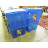 Four large blue PVC storage boxes