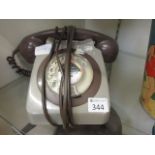 A mid-20th century dial up telephone