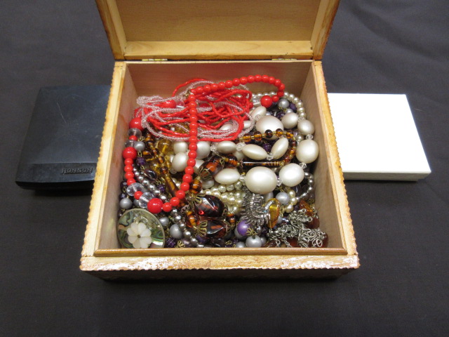 A jewellery box containing an assortment