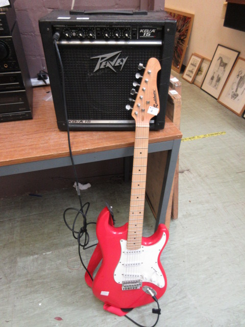 A Rockburn electric guitar together with