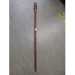 A walking stick with telescope