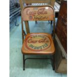 A painted folding chair - 'Coca Cola'
