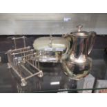 A silver plated hot water jug together w