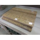 Two granite chopping boards