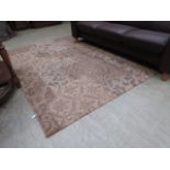 A beige and brown patterned rug