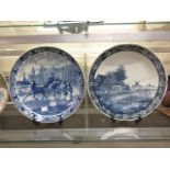 Two blue and white Delft chargers