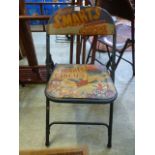 A painted 'Smarts Circus' chair