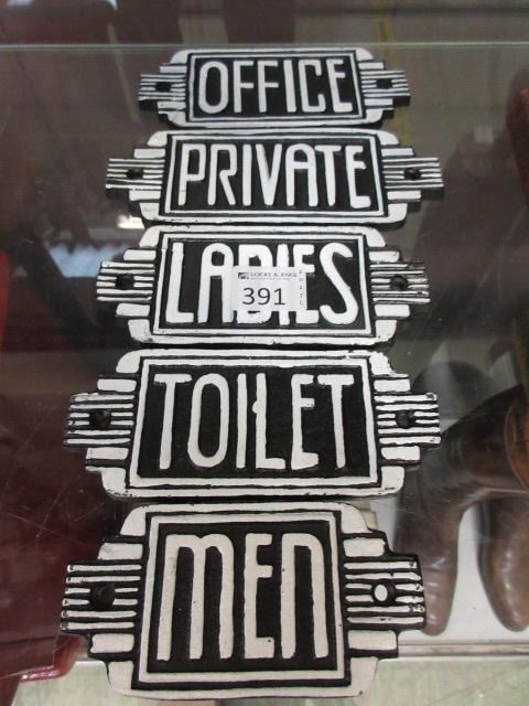 Five Art Deco style signs