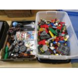 A large box together with a tray of Lego