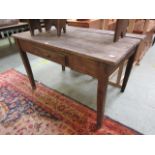 A distressed work table with single draw