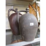 A pair of ceramic storage vessels of bul