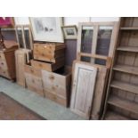 An assortment of pine drawers and doors