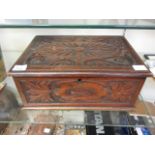 An 19th century carved oak box in the El