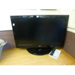 An LG flat screen television receiver wi