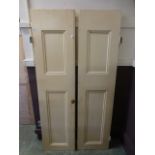 Two cream painted doors