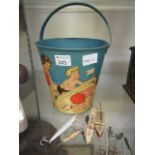An old seaside themed bucket together wi