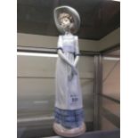 A Nao figure of a lady in a hat