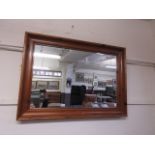 A modern pine rectangular wall mirror