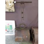 A cast iron and metalwork garden roller