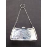 A silver hallmarked engraved purse