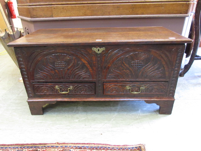 An 18th century and later oak carved fro