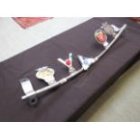 A car badge rack holding an assortment o