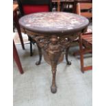 A painted metal base pub table with circ