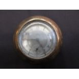 A mid-20th century pocket watch in brass