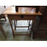 A mid-20th century oak occasional table