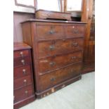 A mahogany veneered chest of two short o