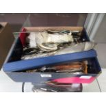 A box of assorted flatware