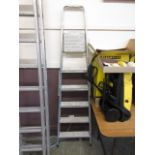 A pair of aluminium step ladders