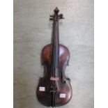 A violin having partial paper label to i