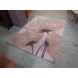 A modern three-tone brown rug