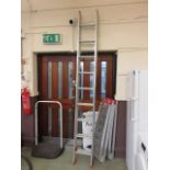 A set of aluminium extending ladders