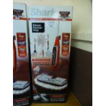 A boxed Shark steam pocket mop