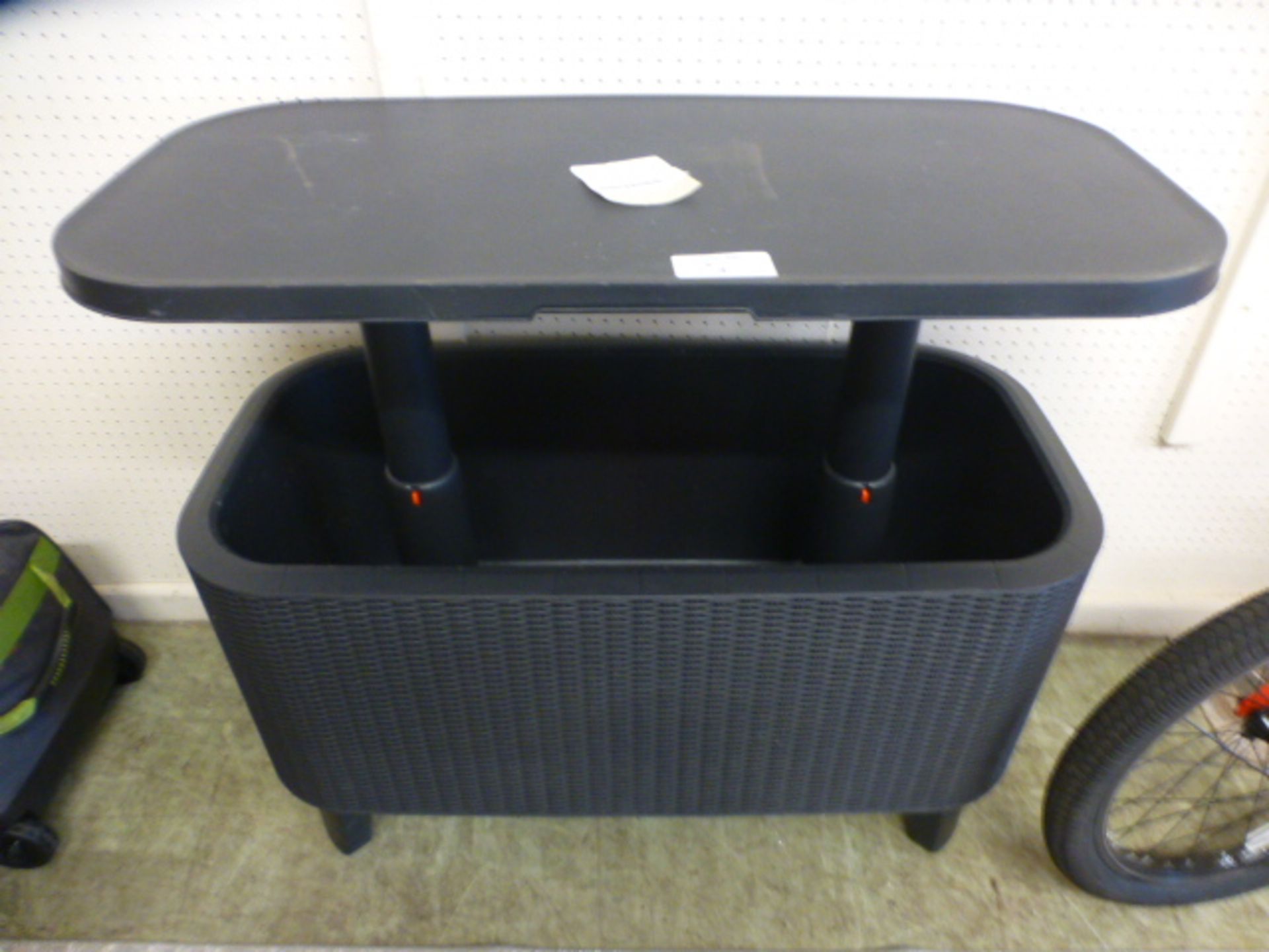 A Keter Cooler Bevy Bar