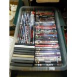 A tray of various DVDs