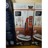 A boxed Shark steam pocket mop