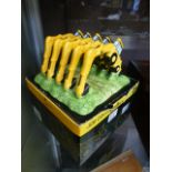 A boxed JCB collectible toast rack