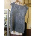 A chain mail sleeveless shirt