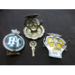 An AA ashtray together with an AA badge,