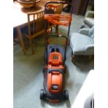 A Black & Decker 30cm electric lawn mowe